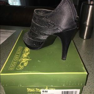 Coach & four heels